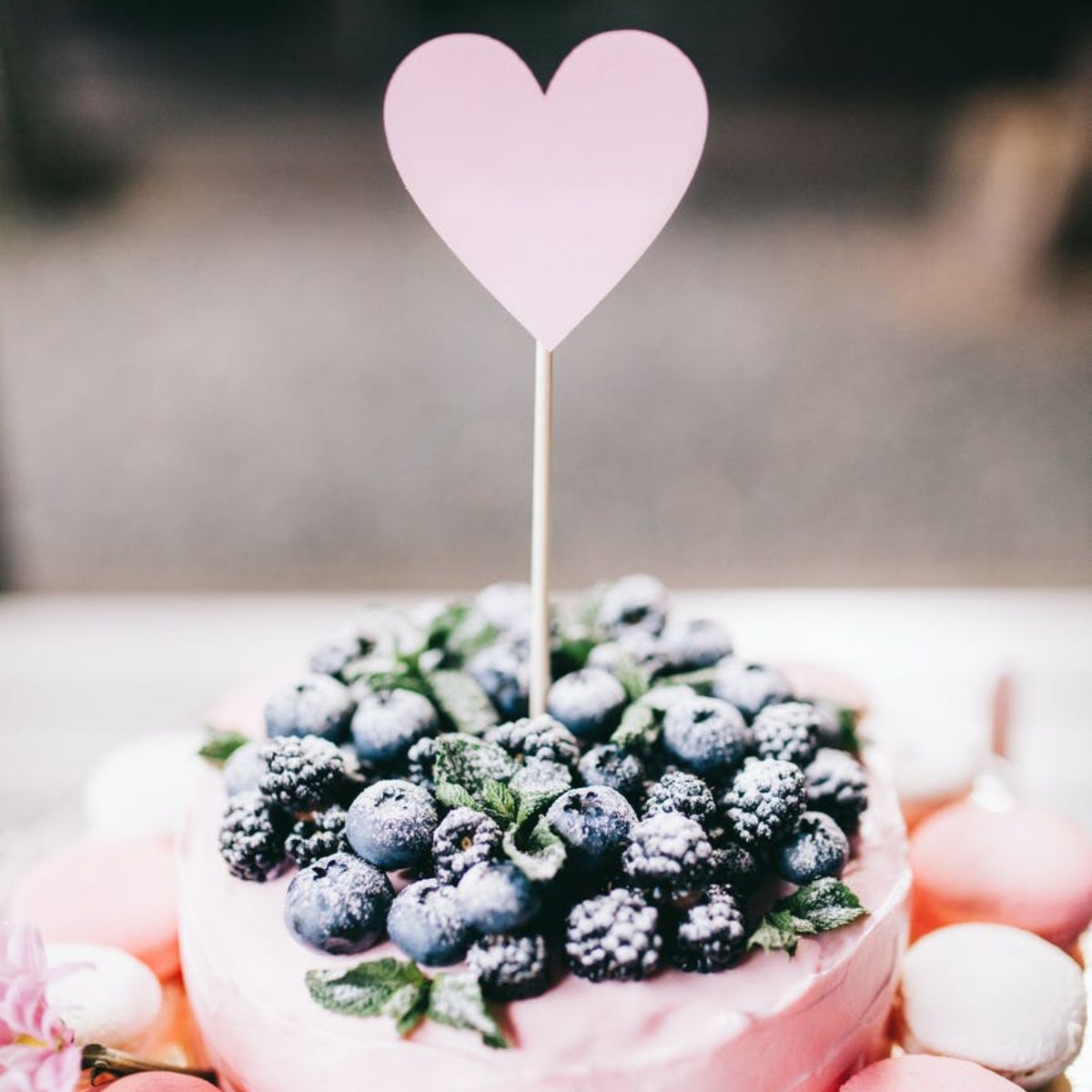 macarons around a cake